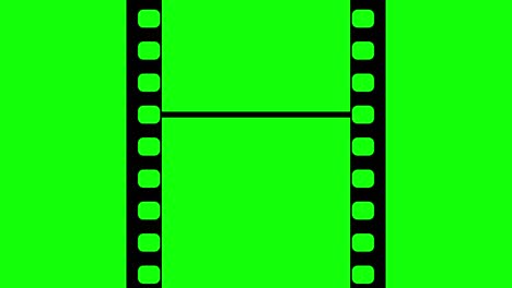 35mm film strip moveing on green background. seamless loopable video footage on green screen