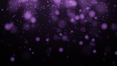 partículas violetas que se mueven en un espacio oscuro