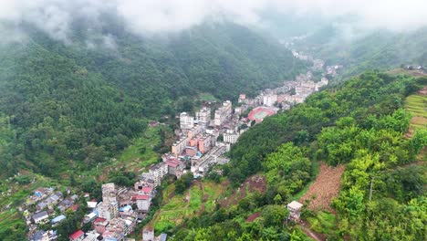 Aerial-Drone-Wide-Shot-of-Yanjin,-The-Narrowest-City-in-The-World-in-China