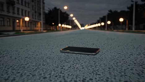 lost phone on an empty street at night