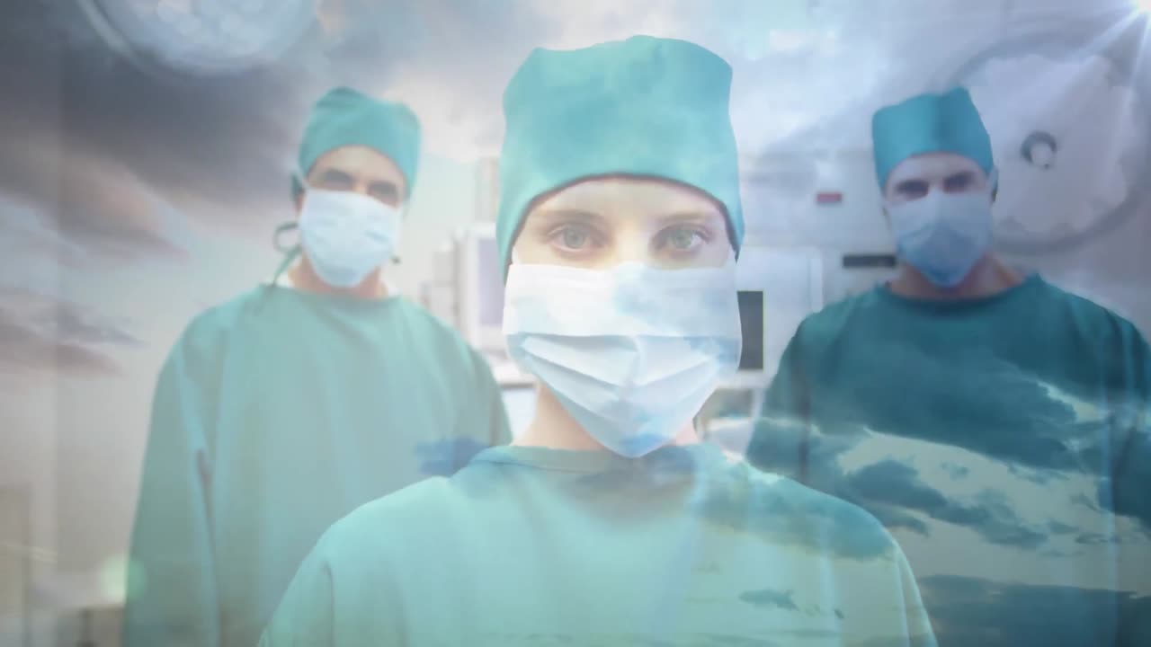 composición digital del retrato del equipo de cirujanos en el hospital contra las nubes en el cielo