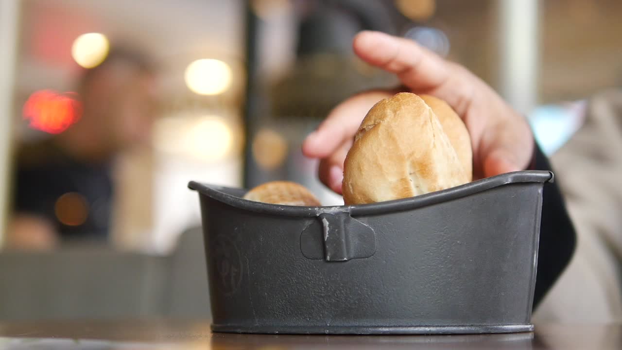 Bread in a container at a cafe