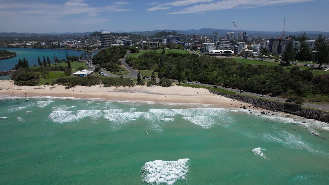 Aerial View of a Beautiful Beach and City Skyline