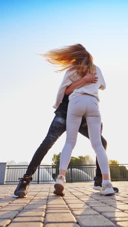dancing together outdoor. vertical video