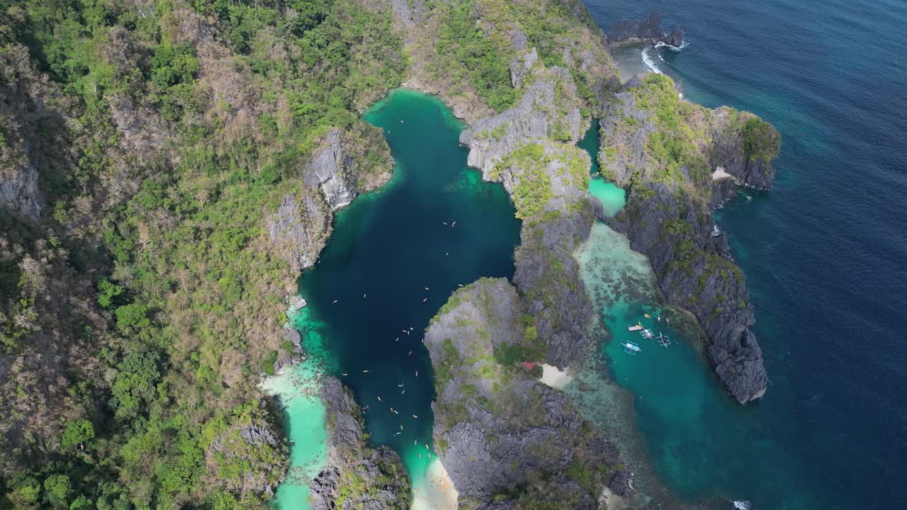 Sweeping Aerial View High Above Small And Big Lagoon of El Nido, Philippines