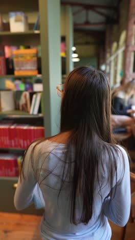 woman in a library cafe