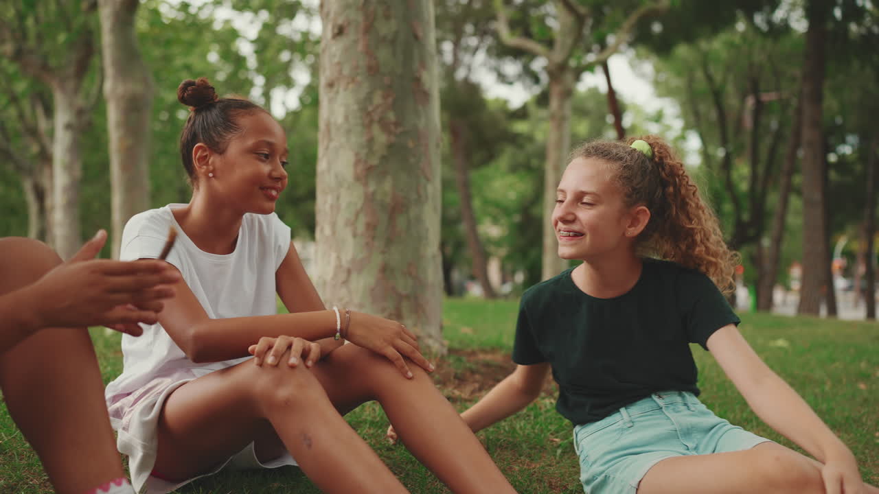 Teenage Girls Relaxing in the Park