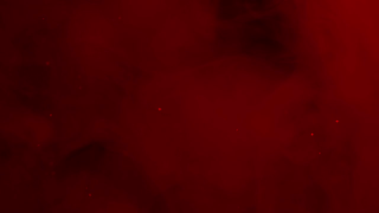 Vortici e particelle di fumo rosso astratto.