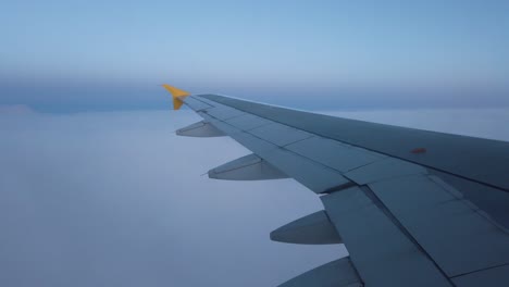 view of an airplane wing during flight
