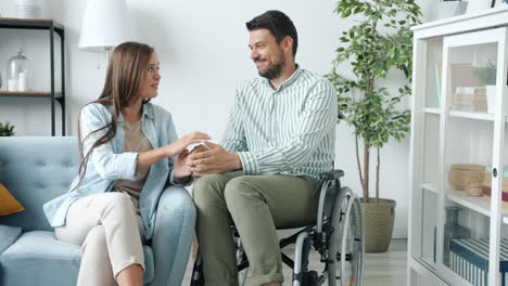 couple having a conversation in living room