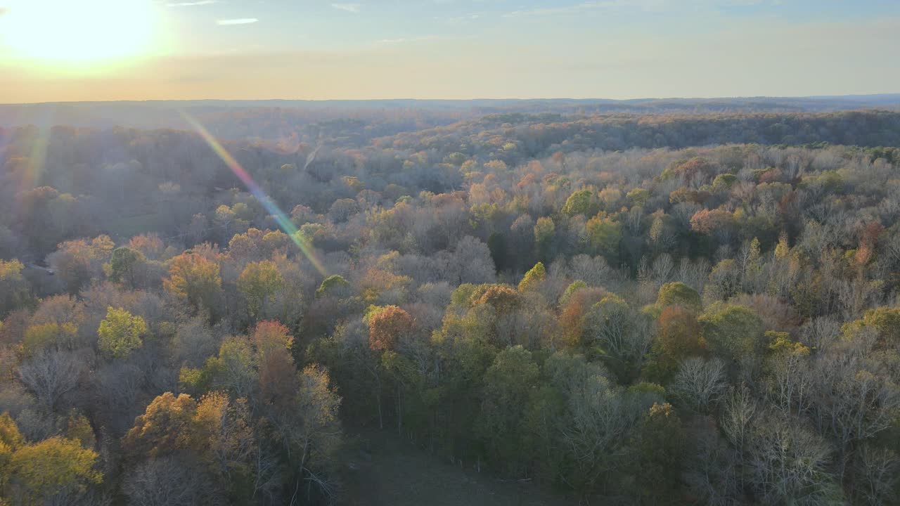 A beautiful sunset with rolling autumn countryside