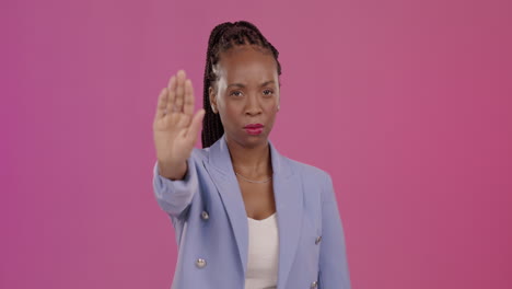 face, stop and hand of black woman in studio