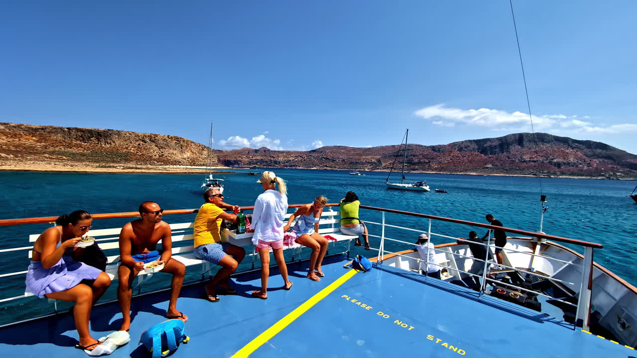 Holiday excursion group boat trip Gramvousa Beach Imeri island Crete Greece