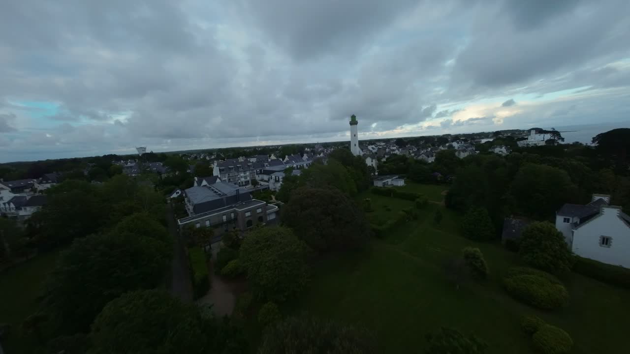 Flying Across River Odet Towards Cale de Benodet With Lighthouse In View. Dramatic Sunset In Benodet, France. FPV drone shot