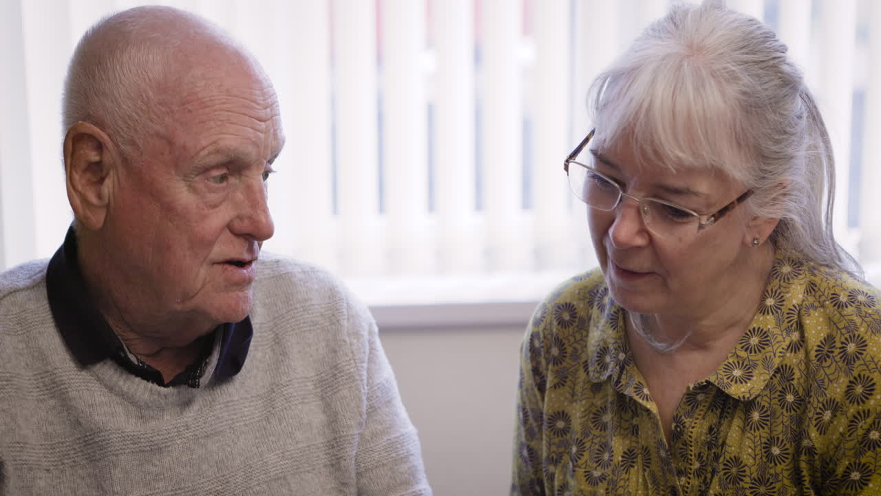 Elderly couple in conversation