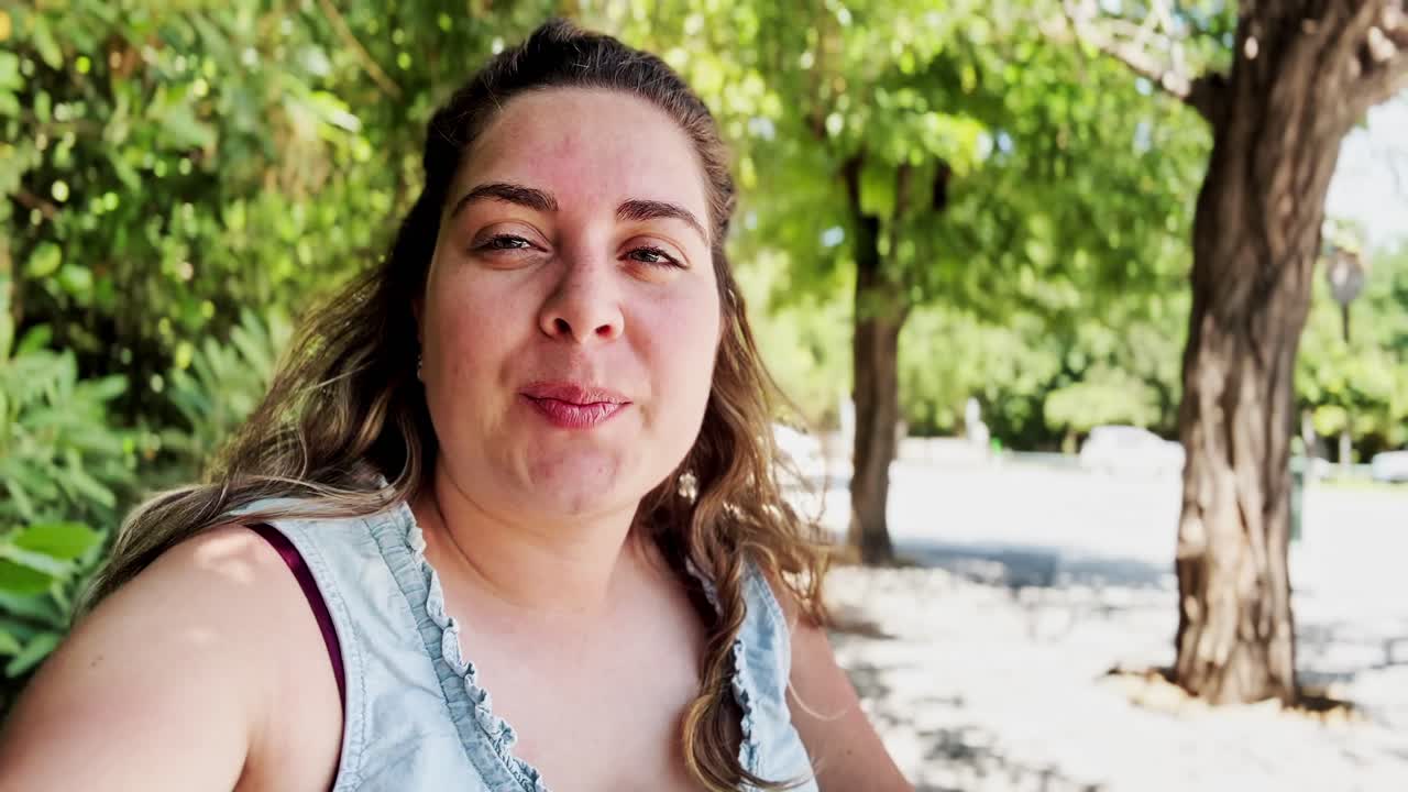 Enthusiastic Vlogger Expressing Joy in Athens National Garden