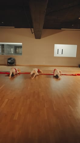 contemporary dance performance with red ribbon