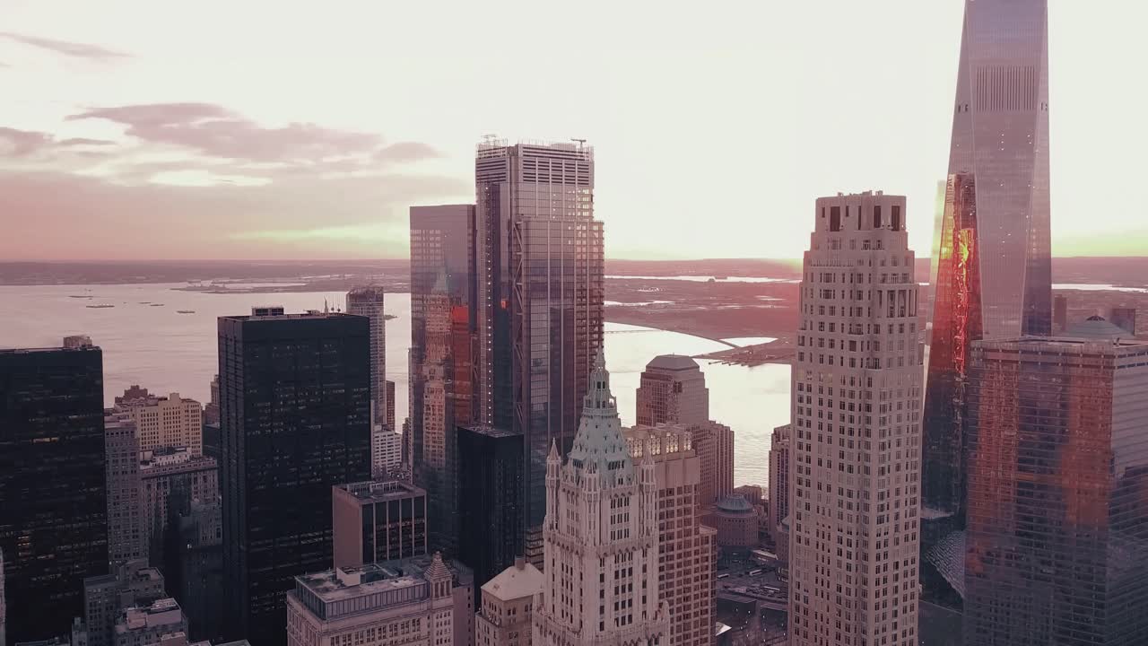 Stunning footage of a city skyline at sunset, showcasing a rich blend of architectural styles—from sleek modern glass towers to ornate traditional buildings