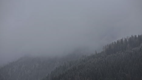 mist, fog and clouds on a mountain hill