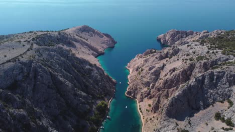 picturesque bay of zavratnica with sunken world war 2 ship, aerial backward