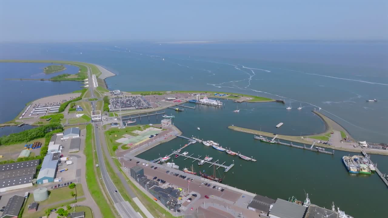 Lauwersoog seaport and marina on the Wadden Sea in the Netherlands, wide aerial shot