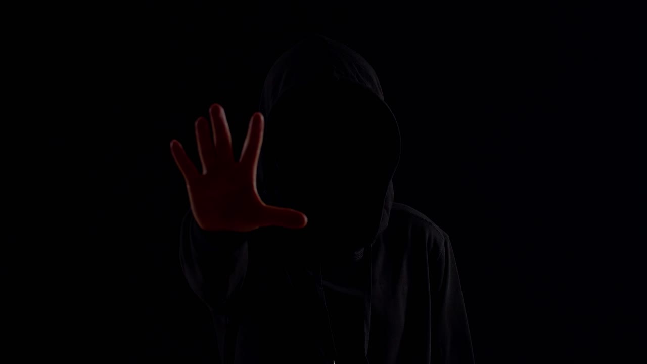 Hacker Showing Stop Hand