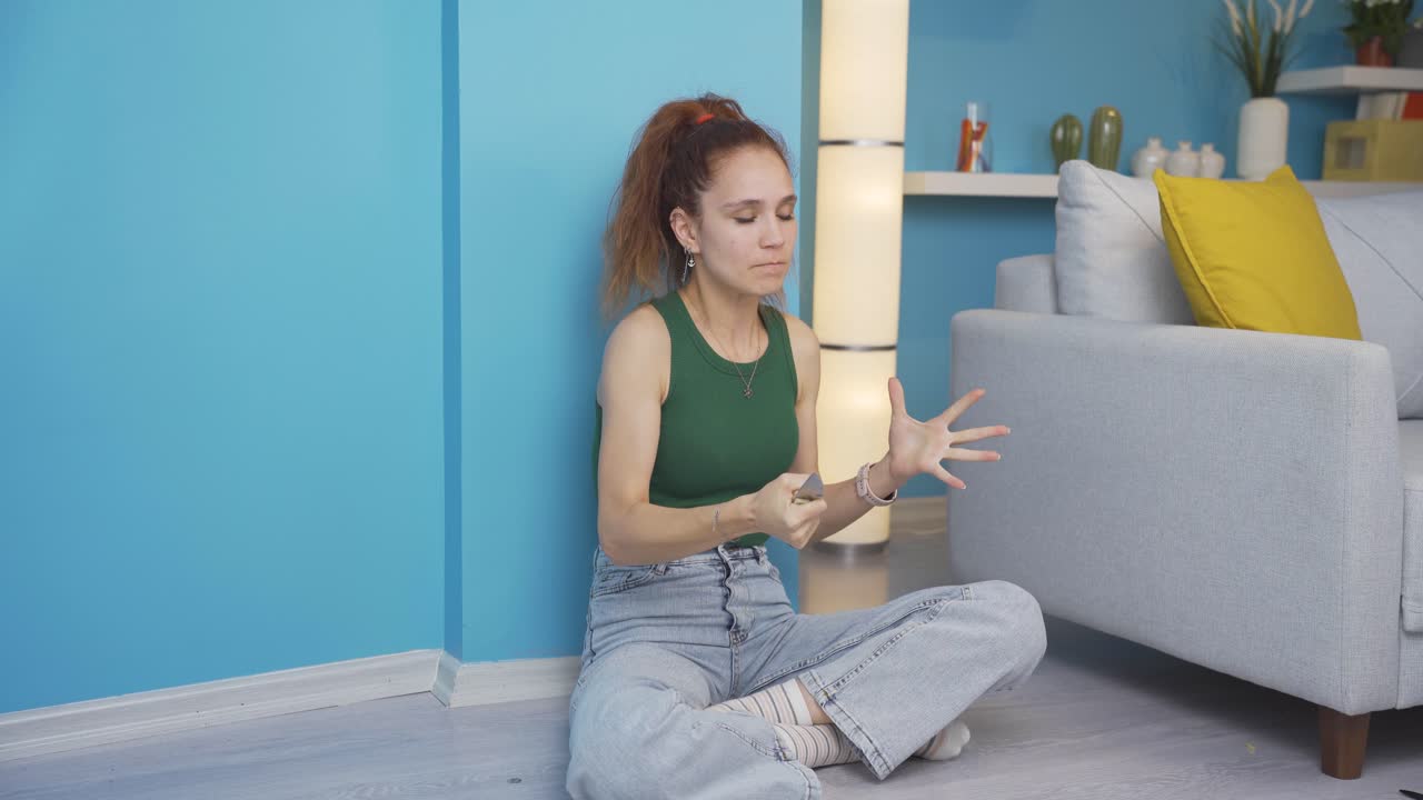 Aggressive and psycho woman playing with a knife.