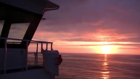 stunning sunset at sea from a ship's bridge