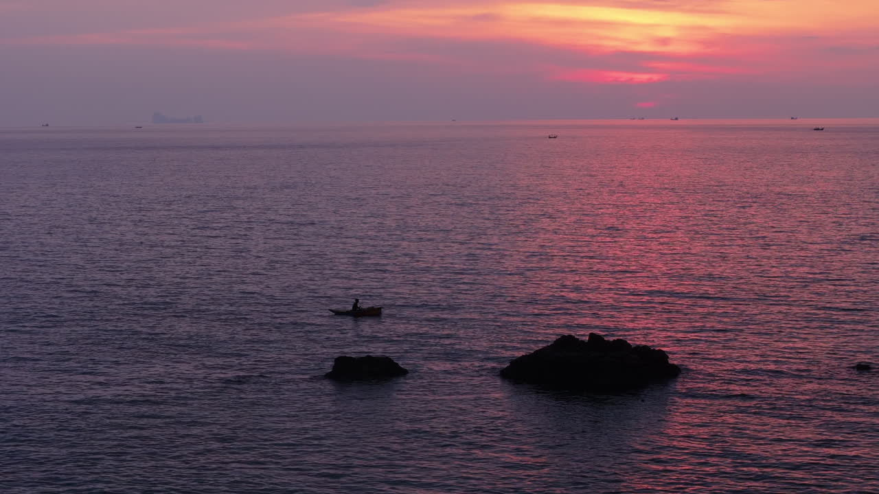 Fisherman at Sunset on the Ocean