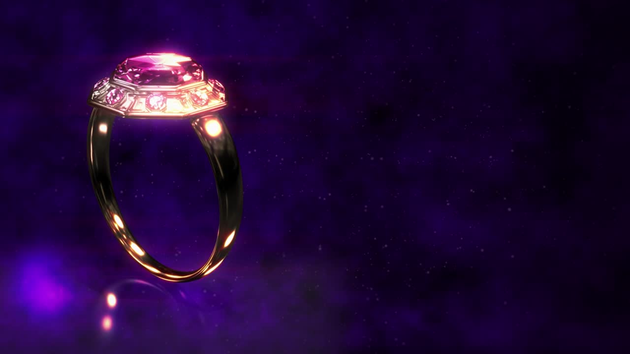 anillo dorado brillante con piedra preciosa rosada girar, video de bucle ficticio
