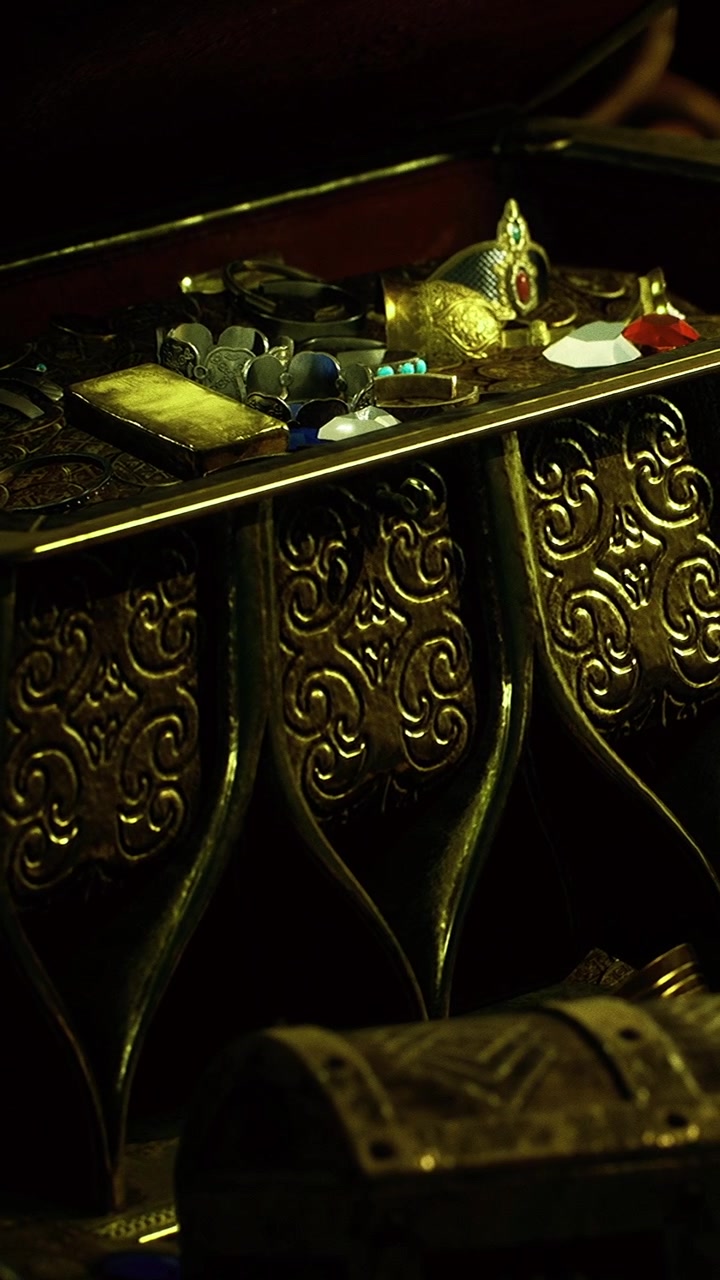 Cofanetto decorativo ricolmo di vari oggetti e tesori in penombra