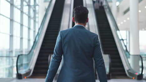 Escalator,-airport-and-business-man-with-luggage