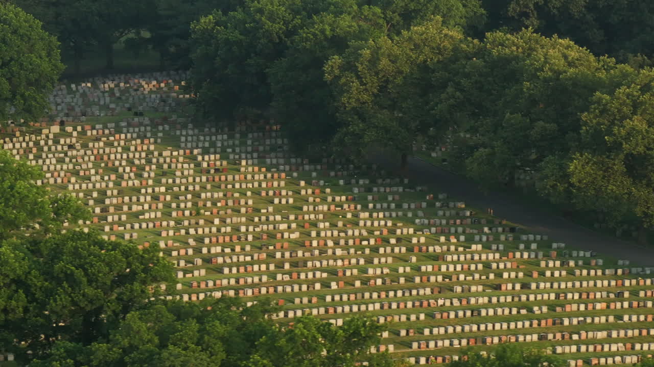 Aerial view of a cemetery at sunrise . Shot during the summer