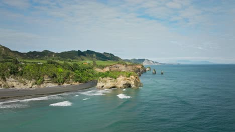 High-tide-at-Elephant-Rock-on-coastline-of-North-Island-New-Zealand,-aerial