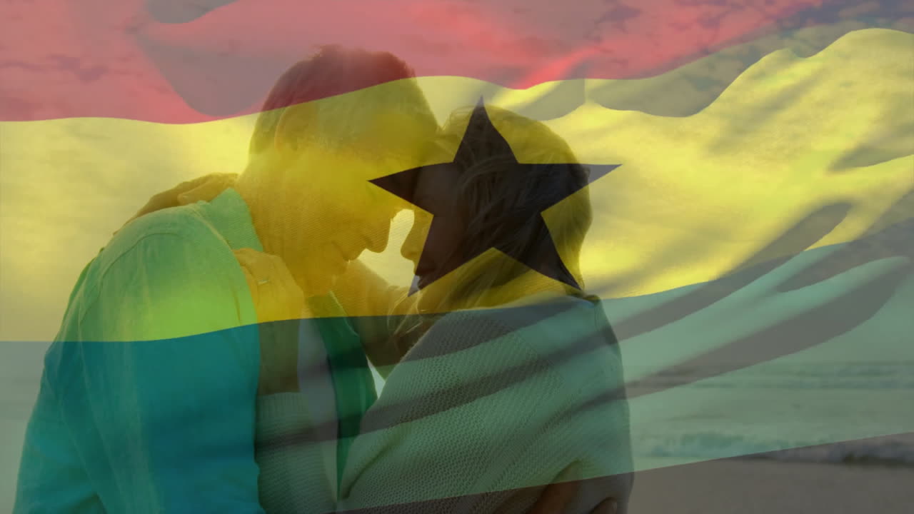 Embracing on beach, couple with Ghana flag animation overlaying scene