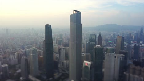 guangzhou city evening time ctf famous building downtown aerial panorama tilt-shift 4k china