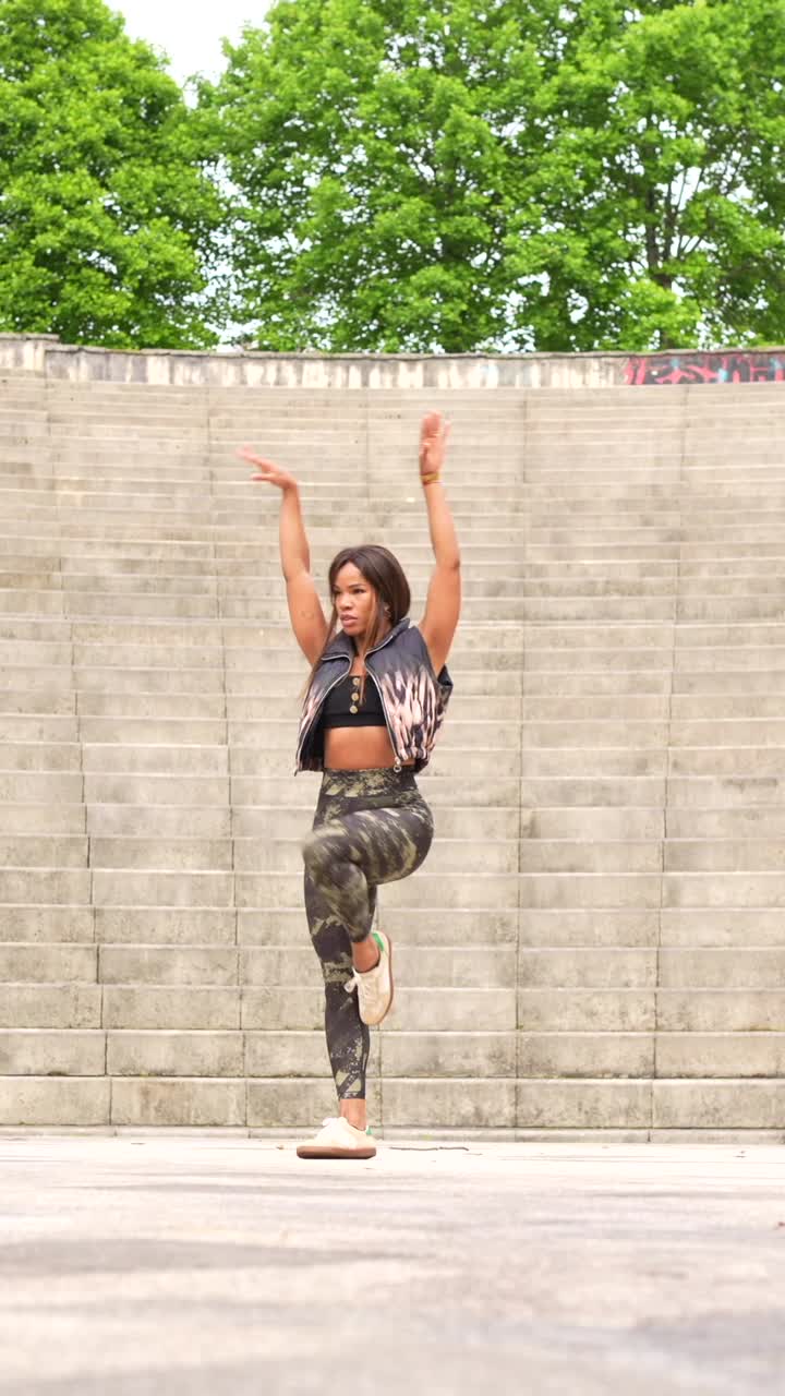 Woman Dancing on Stairs Outdoors
