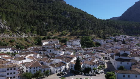 aerial - the village of grazalema in cadiz, andalusia, spain, wide shot rising