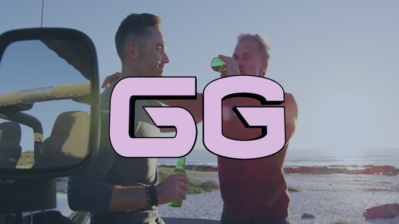 On beach, two men holding drinks with GG animation text overlay