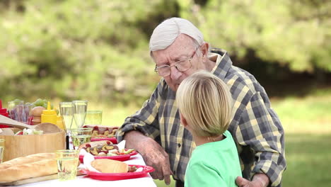 Little-boy-talking-to-grandfather