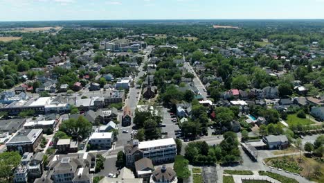 aerial tilt up revealing the coastal village of lewes, delaware, usa