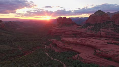 sprawling red rock valley in the desert southwest, trail to merry go round rock at sunset