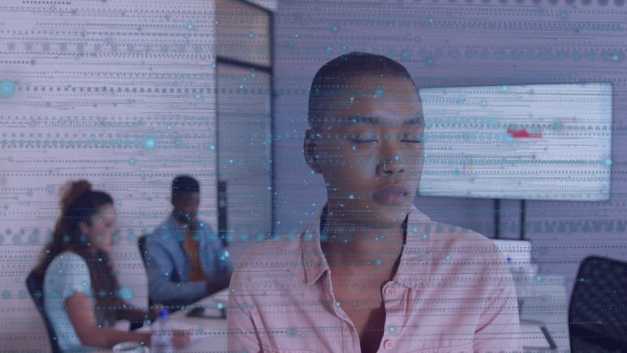 Animation of spots over diverse business people in office