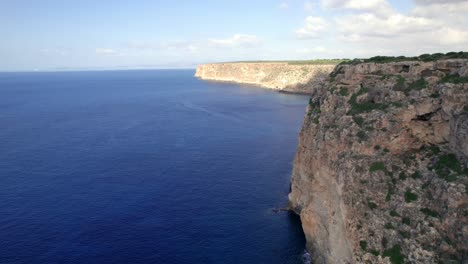 Flying-Along-Coastline-At-Badia-De-Palma-Mallorca,-Spain,-Aerial