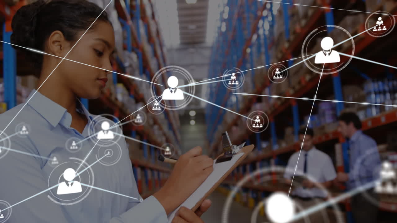 Animation of profile icons connecting dots, biracial female worker writing on pad at warehouse