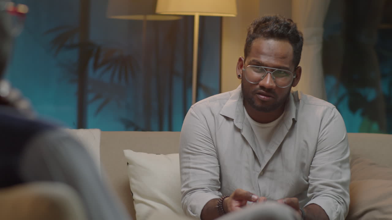 Man Talking on Therapy Session with Psychologist