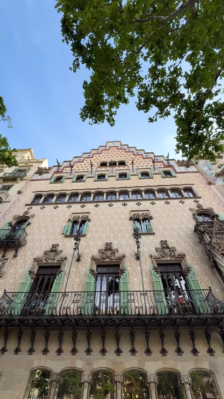 Vertical footage capturing Gaudí's architectural works in Barcelona
