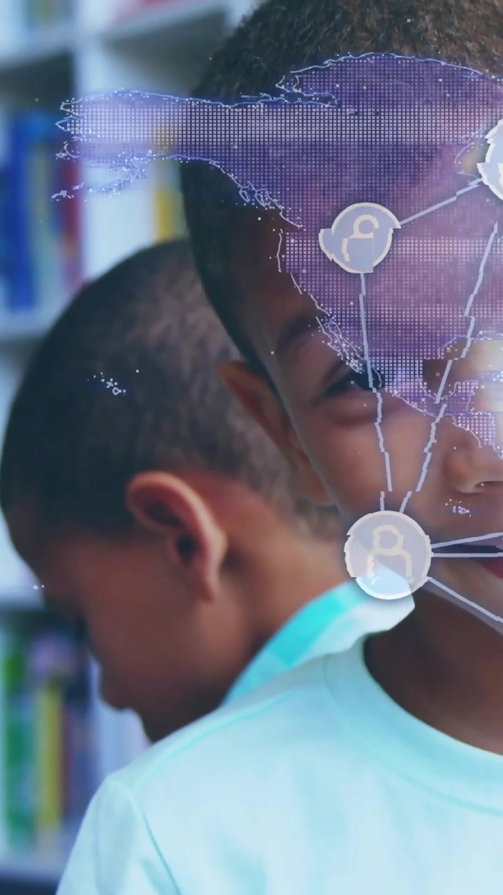 Vertical video: Boy tilting as map overlay fading in across face, revealing shelves for learning