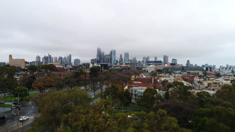 drone reveal of foggy melbourne with clouds