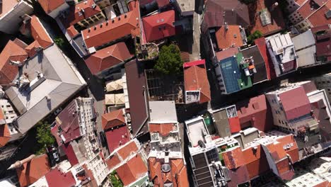 birds eye aerial view above galata tower on busy day in istanbul. top down